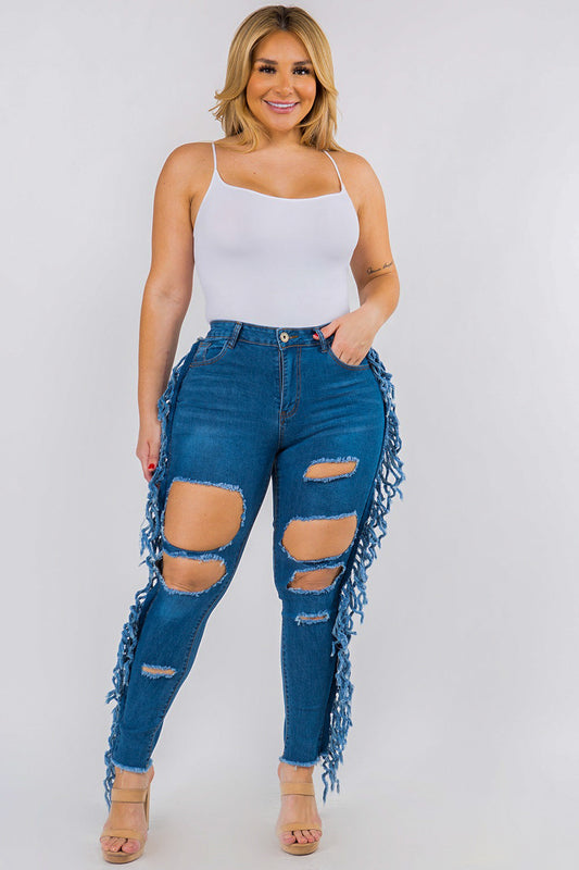 Cut out fringe distressed jeans